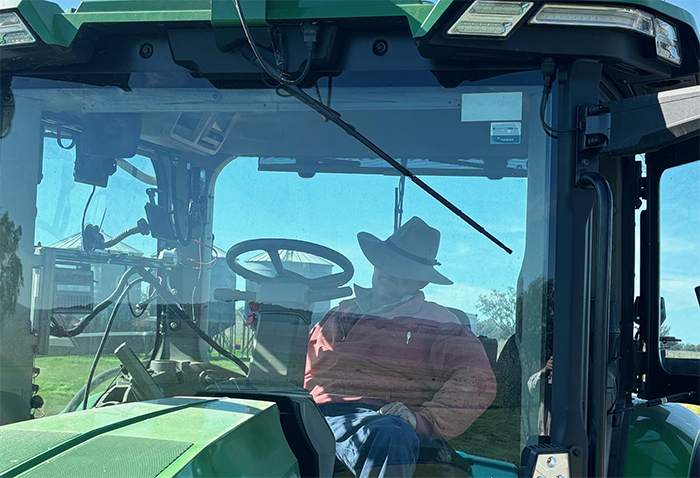 Farmer Sleeping in Tractor